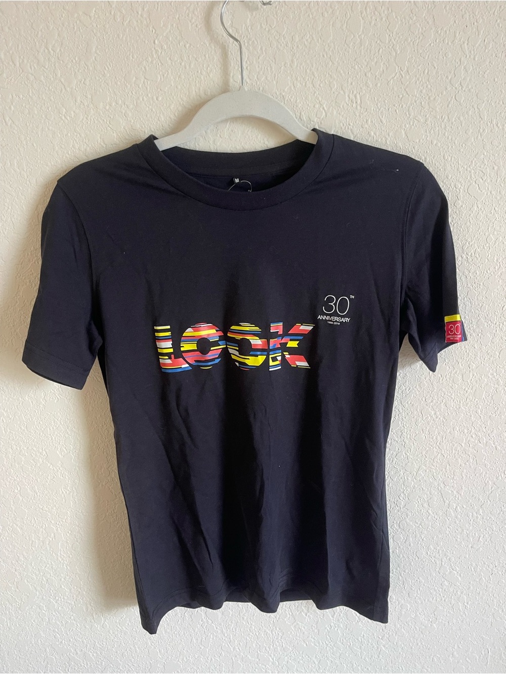 Black 'LOOK' Graphic Tee with Multicolor Stripe Logo